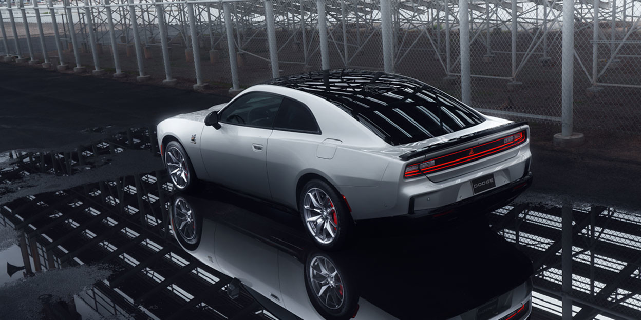 The sleek, all-electric Dodge Charger Daytona in an industrial setting.